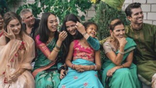 Pascal and Conrad running on a path through a field